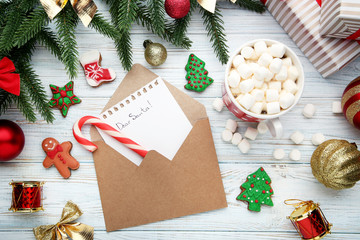 Blank sheet of paper with fir-tree branches and cup of coffee