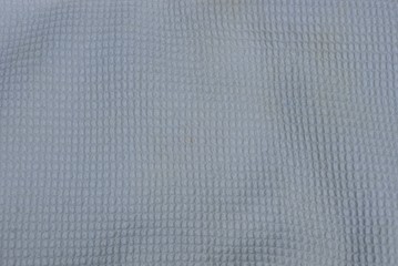 gray fabric background from a crumpled piece of cloth