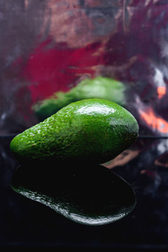 Ripe avakado on a black  slate board