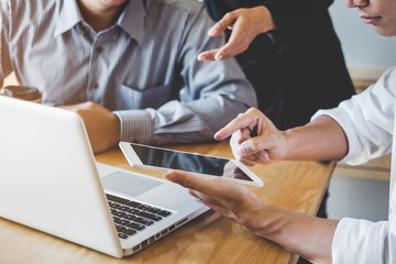 Fototapeta premium Startup business people group meeting, Young creative coworkers team working and discussing new plan project in office, entrepreneurs, brainstorming, Teamwork, professional business team