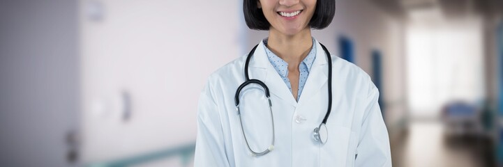 Composite image of confident doctor standing against grey