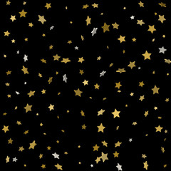 Fototapeta na wymiar Holiday background with little golden stars isolated on black