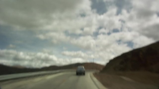Timelapse POV of drive through mountains Tibet