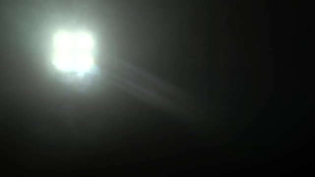 Shimmering flashlights in smoke