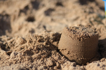 toys on the sandy beach by the sea.