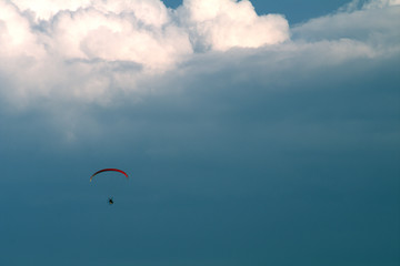 motorized paraglider,sky,cloud,cumulus,fun,freedom,white,sport,fly,cloudscape,air,adventure,wind