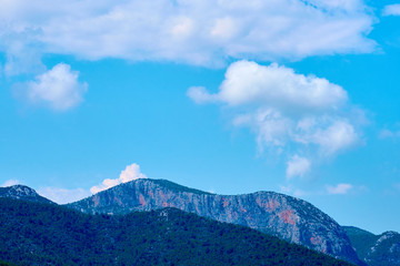 Fototapeta premium Rocks and clouds in sky in Alanya, Turkey. 