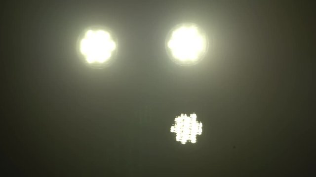 Stage lights , Floodlights shining brightly and turning on and off