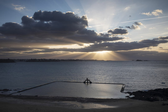 The swimming pool at sunset on the Plage de Bon Secours, St. Malo, Ille et Vilaine, Brittany, France