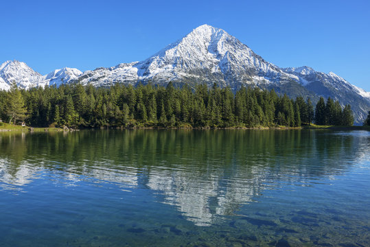 Arni lake with Bristen mountain at fall, Uri, Switzerland