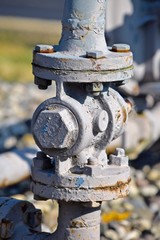 gas lines rusty plumbing pipe connections close-up vertical