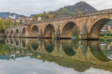 Fototapeta premium Visegrad, Bosnia & Herzegovina - the Mehmed Paša Sokolovic Bridge is one of the main landmarks in the country, and Visegrad one of the pearls of the Balkans