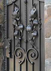 Forged leaves on metal gates