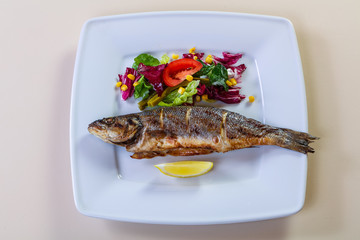 Grilled seabass with lemon