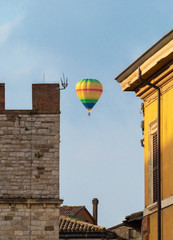 Fototapeta na wymiar Todi (Umbria, Italy) - The suggestive medieval town of Umbria region, in a summer sunday morning, during the hot air balloons contest 