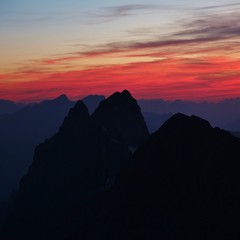 Sunset view from mount Titlis, Switzerland. Red sky over mount Wendestock.