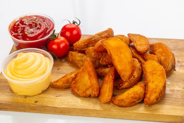 Fried potato with sauce