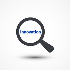 Magnifying glass with words innovation on white background