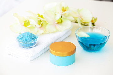 Fototapeta na wymiar Spa. Blue Bath Salt Beauty Treatment on White Background