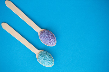 Spa. Sea Salt Grind On Wooden Light Blue Shabby Table Wooden Spoon. Kitchen And Cosmetic Healthy Usage