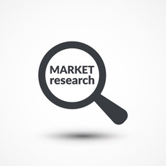 Magnifying glass with words market research on white background