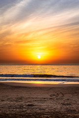 Fototapeta na wymiar Sun over the sea on sunrise