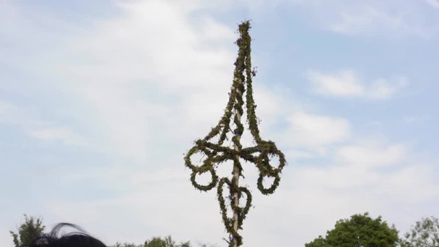 Swedish Midsummer Pole. Traditional Midsummer Festival At Skansen. Travel Sweden.