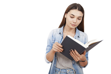 Fototapeta premium young woman reading book