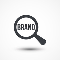 Magnifier with brand word on white background