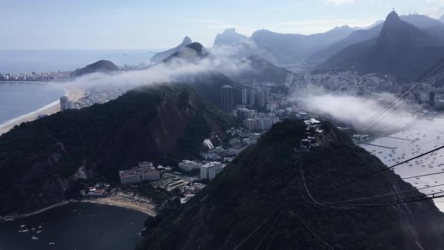 Rio de Janeiro scenic skyline view with time lapse mist moving across limestone mountain peaks