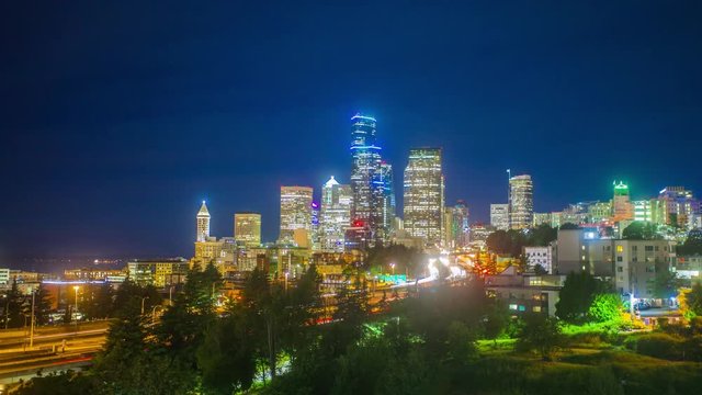 4K Cinematic urban time lapse in motion dynamic video view of Seattle, Washington downtown at night