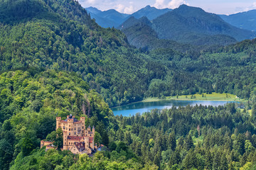Fussen, Germany- June 10, 2018: Lake Alpsee and Hohenschwangau Castle. View of Schloss...