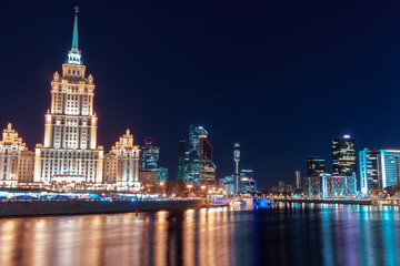 Fototapeta na wymiar night city landscape quay of Taras Shevchenko view of the hotel Ukraine and Moscow city