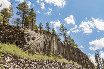 Fototapeta premium A Wall of Columnar Basalt at Devil's Postpile, Mammoth Lakes, California