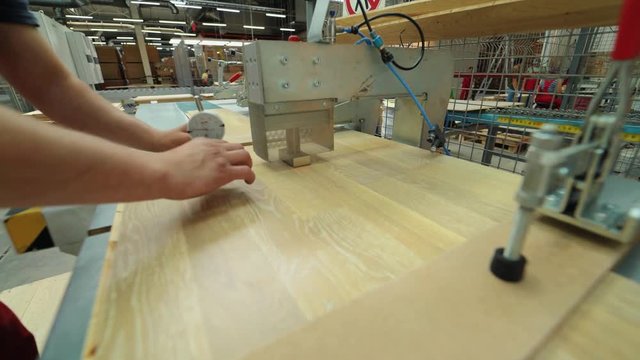 Manufacturing of a parquet board. Automated machinery equipment.