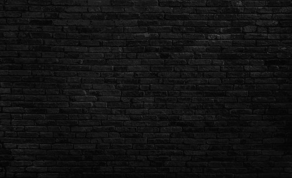 Fototapeta Old black brick wall texture background,brick wall texture for for interior or exterior design backdrop,vintage dark tone.