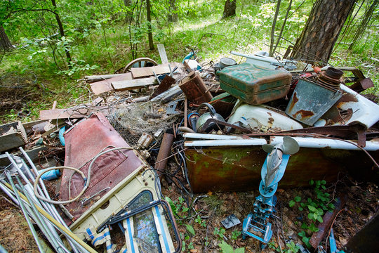 Dump old metal objects in the woods, rusty scrap metal.  Environ