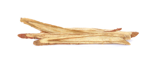 dried Liquorice roots on a white background.
