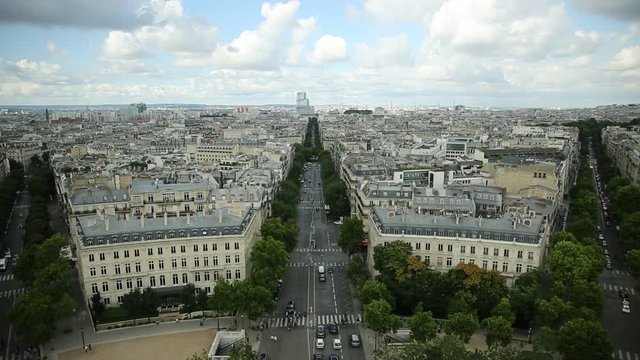 Aerial view of Paris skyline from Arc de Triomphe in a beautiful sunny day with blue sky. Avenue de Wagram from Triumphal Arch. Paris Capital of France in Europe. Scenic urban cityscape.