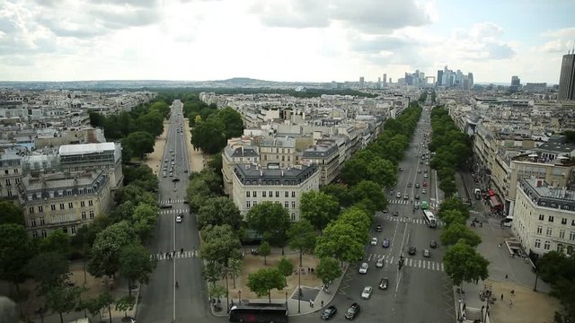 Place Charles de Gaulle square panorama at sunset from Arc de Triomphe top terrace with Paris skyline in France, Europe. Scenic urban cityscape.