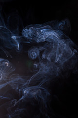 Smoke on a black background.