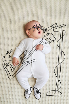 Little baby girl sketched as rock star