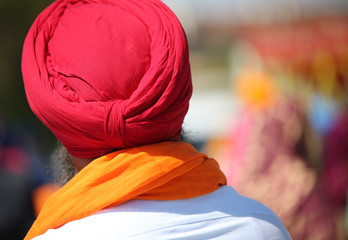 sihk man with red turban