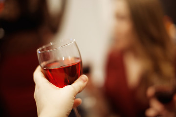 Glass of wine in hand