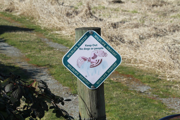 A wildlife habitat sign
