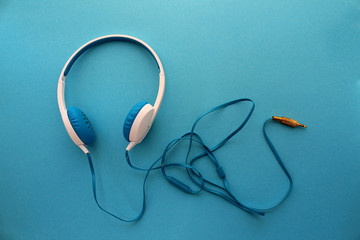 headphones blue color on the background of the same color