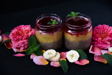 Obraz na płótnie Canvas desert chia pudding. tea rose with banana. art soft focus