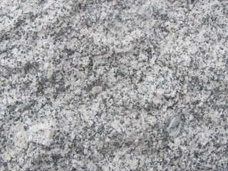 Fragment of a wall with a lining of gray granite