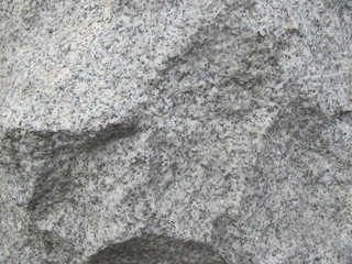 Fragment of a wall with a lining of gray granite
