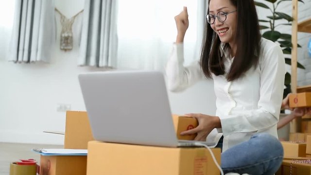 Young Asian Woman Working at home, Young business start up. Young Asian Woman Working at home, Young Owner Woman Start up for Business Online, SME, Delivery Project, Woman with Online Business or SME 